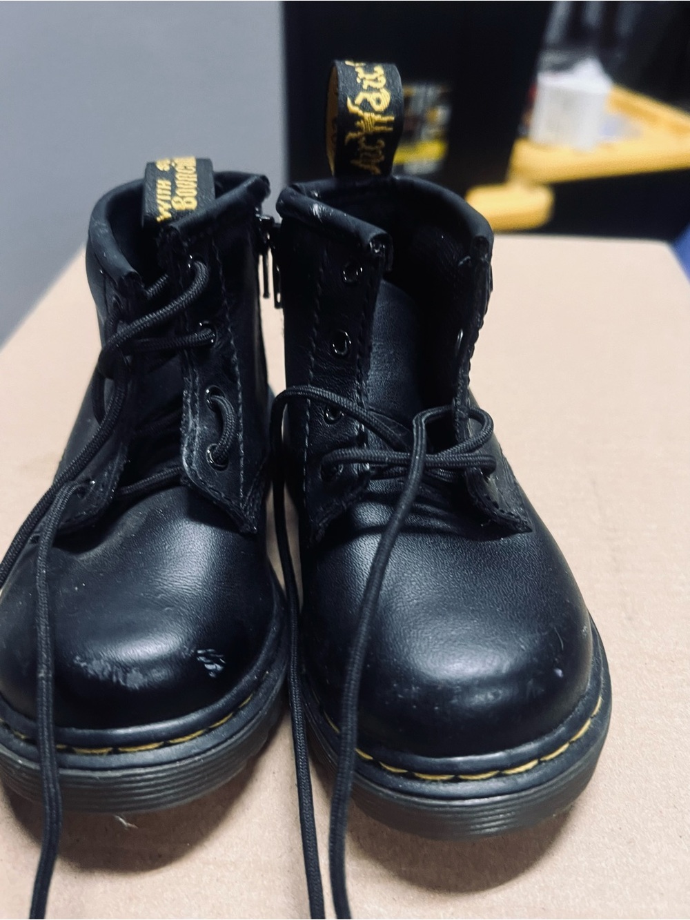 Dr. Martens Kids Black Leather Lace-Up Ankle Boots with Yellow Stitching
